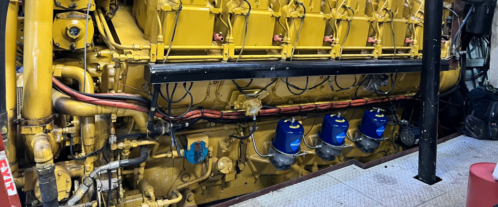 centrifugal oil filter on CAT engine cropped